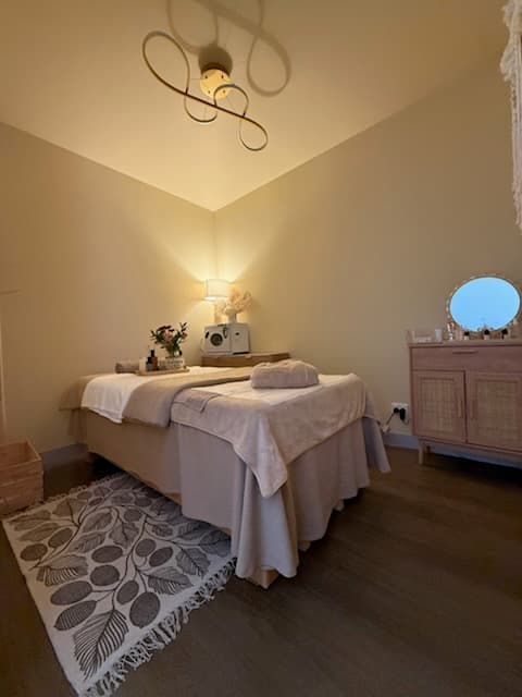 Warm lamplit treatment room at Havenly Wellness & Head Spa